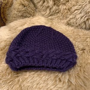 Nine West plum colored acrylic boho knit hat.